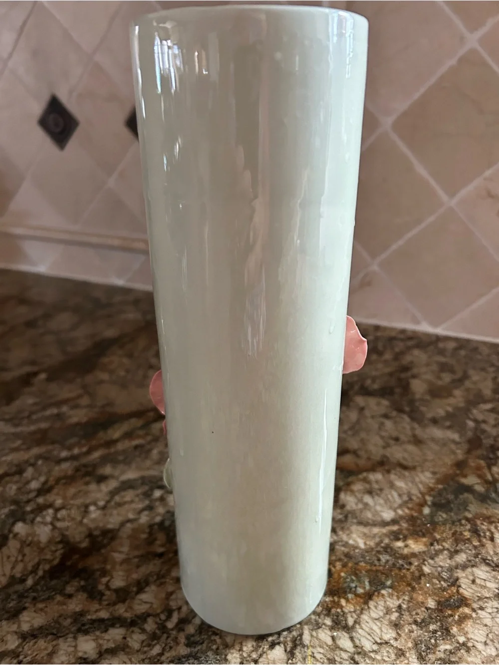 Beautiful mint green vase with pink applied flowers 10” high.
